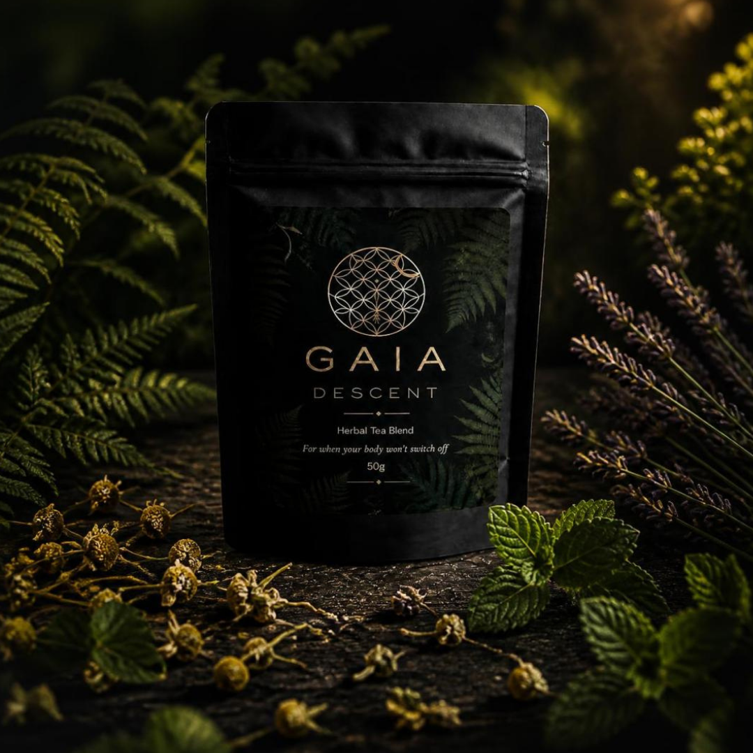 GAIA DESCENT tea package surrounded by herbs and plants on a dark background