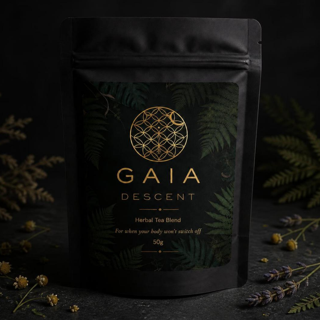 Black tea packaging with 'Gaia Descent' branding on a dark background with herbs.